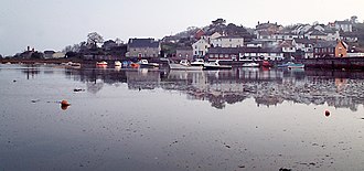 Cockwood, seen from across its harbour, with the tide in. Cockwood in Devon.jpg