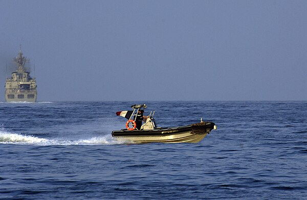 A team of Fusiliers Marins launches on a rigid-hulled inflatable boat