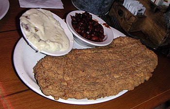Country-fried steak, with baked beans and mash...