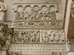 Lower register of bas reliefs on the west front: Domninus as chamberlain crowns Maximian; Maximian told of Domninus' conversion
