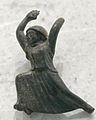 Female figurine running Louvre Br171