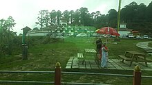 Full view of Dochula Pass in Bhutan with the forest background Full view of Dachula pass with forest background.jpg