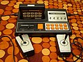 Hanimex TVG-070C with cartridge and joysticks.