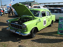 A reproduction of the Holden FE raced by Bruce McPhee in Appendix J Touring Car races Holden FE race car (15750613379).jpg