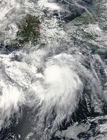 Спутниковый снимок тропического шторма Илеана с максимальной интенсивностью у западного побережья Мексики 5 августа.