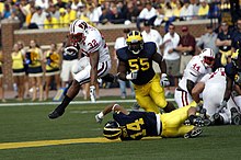 Clay carries the ball against Michigan in 2008 John Clay at Michigan 2008.jpg