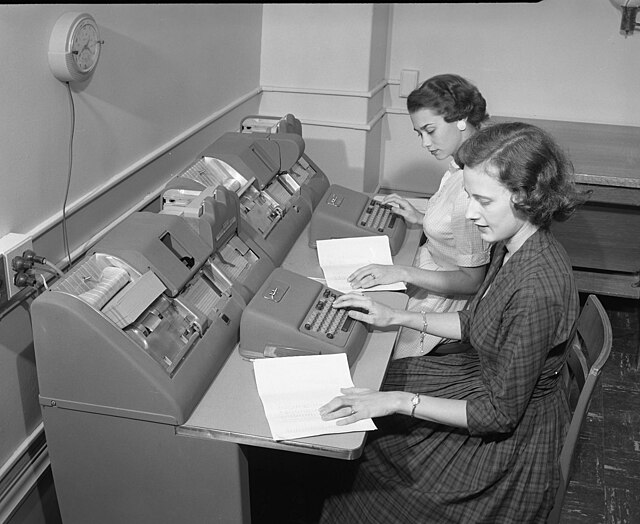 Staff at Texas A&M entering data for punch cards for new computers in the 1950s