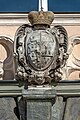 English: Coat of arms of the state Carinthia at the overdoor of the western portall Deutsch: Kärntner Wappenrelief als Supraporte des westlichen Portals