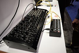 Korg MS-20M Kit + SQ-1 step sequencer - left angled view - 2015 NAMM Show.jpg