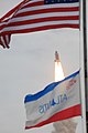 Last launch of Space Shuttle with National and shuttle flag.jpg