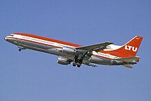 Lockheed L-1011-100 TriStar D-AERN in typical red roof livery taking off at home base Düsseldorf Airport.