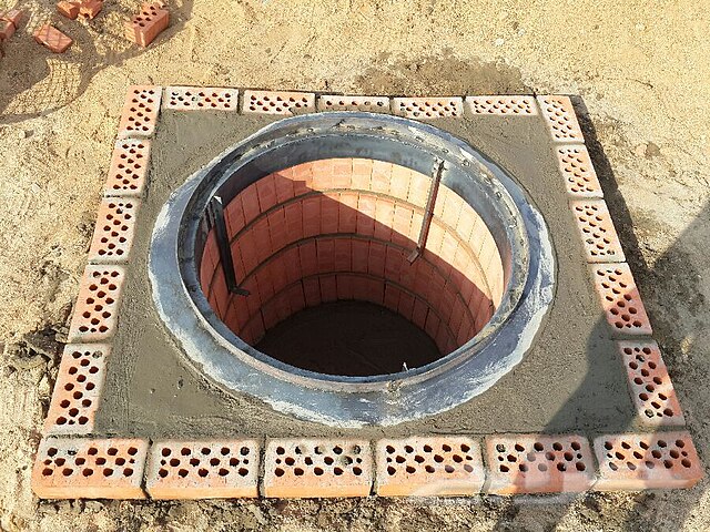 A pit made from brick and mortar built for Mandi cooking.