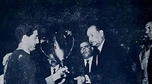 Maslahat Naqil Al-Rukab awarded Iraq Central FA Perseverance Cup (1965).jpg