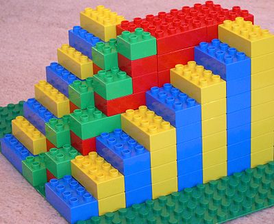 An alternating tread stair (center) between a half-width stair (left) and full-width stair (right), built with Duplo blocks