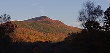 Western face of Mount Aeolus in the light of the sunset in October 2021.