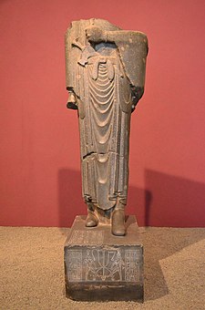 Statue of Darius, with a quadrilingual inscription at its base