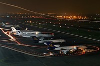 Parked Airliner in Mehrabad International Airport at night.jpg