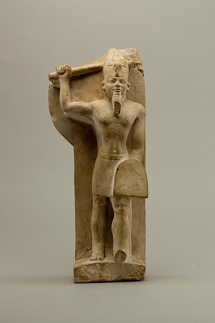 An Egyptian depiction of Resheph as a "menacing god" brandishing a weapon and holding a shield. Metropolitan Museum of Art.