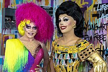 Art Simone (left) and Etcetera Etcetera (right) at RuPaul's DragCon LA in 2022; the two have toured together. RuPaul DragCon 2022 (52073256791).jpg