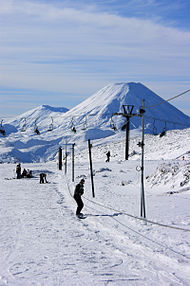 Hut Flat Rope Tow (removed after 2014 season) with Mount Ngauruhoe behind Ruapehu-006.jpg