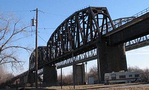 Rulo Rail Bridge from the Nebraska side. The road bridge is just to the south. Rulo-bridge-train.jpg