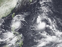 Typhoon Saola [Goring] making a loop east of Luzon (left) and Tropical Storm Haikui [Hanna] (right) developing near the Northern Mariana Islands in the Northwest Pacific Ocean Saola and Haikui 2023-08-29 0230Z.jpg