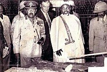 Sultan Alimirah Hanfare of Afar with Emperor Haile Selassie on the right and the Emperor's son Crown Prince Asfaw Wossen on the left Sultan of Aussa, the emperor's friend.jpg