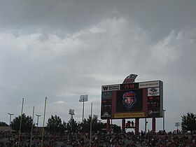 Texas Tech vs. New Mexico in 2011, clouds and scoreboard during first weather delay