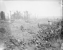 Men of 5 Platoon, B Company, 15th (Service) Battalion, Hampshire Regiment resting before going into the trenches. Southern Road, Mametz Wood, France, 17 July 1916. The Battle of the Somme, July-november 1916 Q3978.jpg