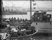 British and French troops evacuated from Dunkirk arrive at Dover. The British Army in the UK- Evacuation From Dunkirk, May-June 1940 H1621.jpg