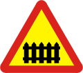 Railway crossing with gate or barrier