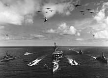 A United States Navy Atlantic Fleet task force underway in 1959. The ships include an aircraft carrier, two submarines, and seven destroyers. USS Valley Forge (CVS-45) underway with Task Group Alfa, in 1959 (USN 1043094).jpg