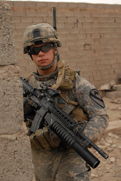 File:US Army 51059 BAGHDAD - Pfc. Dan Cesiastis, an infantryman from Worcester, Mass., takes up a spot between cinder block walls to pull security while on a joint patrol with Iraqi Army Soldiers of the 44th Brigade, 11.jpg