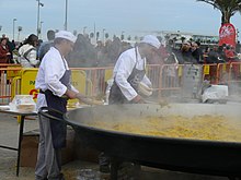 Giant paella being served