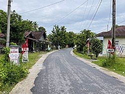 Tanda selamat datang di Desa Kampung Mudik