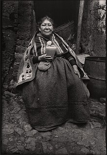 A woman drinking chicha in Cusco, Peru. Photo by Martin Chambi, 1931 Woman Drinking Chicha by Martin Chambi 1931.jpg