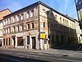 Residential house with shop in a corner