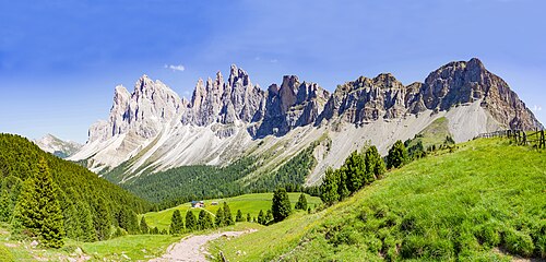The alpine pasture Resciesa with the Odles group in Gherdëina, South Tyrol - Unesco World Heritage Dolomites, Puez-Geisler Nature Park.