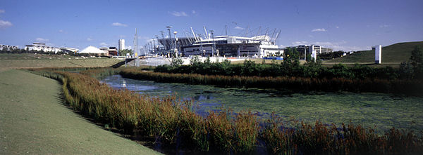 Daytime view of pond with waterlilies at Sydney Olympic Park during the 2000 Sydney Paralympic Games