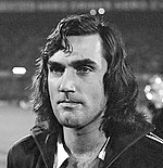 Footballer George Best wore long hair in 1976. 1976-George-Best.jpg