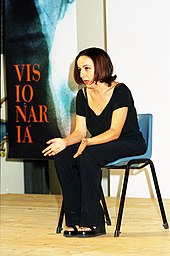 A woman sitting on a chair 1999-Anna Meacci.jpg