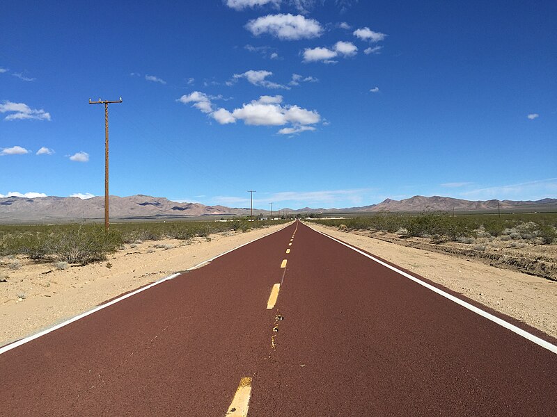 File:2015-11-03 13 36 53 View east along a section of Nipton Road near Nipton, California with reddish asphaltic concrete.jpg