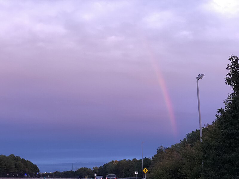 File:2020-10-16 18 29 12 Rainbow viewed along the back edge of a dark band of clouds associated with a cold front viewed from Virginia State Route 267 (Dulles Toll Road) at Exit 13 in Reston, Fairfax County, Virginia.jpg