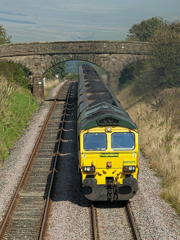 66525 at Newsholme with a loaded coal train from Killoch in Ayrshire. This is close to the site of the old Newsholme railway station