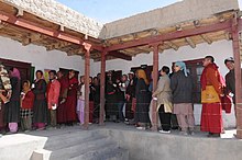 Voters in a queue at a polling booth near Thiksey Monastery in Ladakh, JK, during the 2009 Indian general election A large number of voters with their voter identity card in a queue at a polling booth near Thiksey Monastery in Ladakh during the 5th and final phase of General Election-2009, in J&K on May 13, 2009.jpg