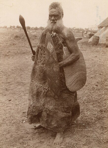 File:Aboriginal man carrying a shield, waddy and boomerang, South Australia, ca. 1875.jpg