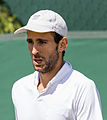 Adrián Menéndez-Maceiras competing in the first round of the 2015 Wimbledon Qualifying Tournament at the Bank of England Sports Grounds in Roehampton, England. The winners of three rounds of competition qualify for the main draw of Wimbledon the following week.