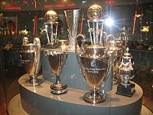 Several of Ajax' international trophies, including the Champions League and Intercontinental Cup trophies. Ajax puchar.JPG