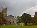 The church at Avebury, with a rare double rainbow.