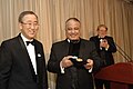 Ban Ki-moon awarding Talal Al-Haj a UNCA Gold Award.jpg